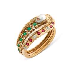 CARTIER MID-20TH CENTURY PEARL, RUBY, EMERALD AND DIAMOND BANGLE