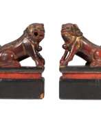 Overview. 19th Century Pair of Chinese Guardian Lions in Red and Gold Lacquer
