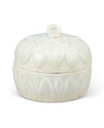 Porcelain. A MOULDED QINGBAI ‘LOTUS’ BOX AND COVER