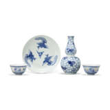 A BLUE AND WHITE DOUBLE-GOURD FORM VASE, A BLUE AND WHITE ‘PHOENIX’ DISH AND A PAIR OF BLUE AND WHITE RETICULATED BOWLS - photo 1