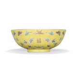 A YELLOW-GROUND FAMILLE ROSE 'BUTTERFLIES' BOWL - photo 1