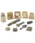 Han-Dynastie. A GROUP OF ELEVEN ARCHAIC ORNAMENTS Han-Dynastie. A GROUP OF ELEVEN ARCHAIC ORNAMENTS
