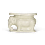 A WHITE-GLAZED ELEPHANT-SHAPED PILLOW - фото 1