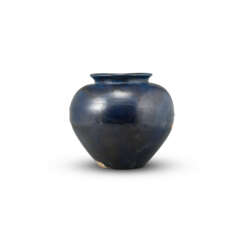A BLUE-GLAZED POTTERY JAR