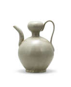 Five Dynasties. A YUE CELADON DOUBLE-GOURD EWER
