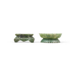 A SPINACH GREEN JADE LOTUS-FORM STAND AND A SPINACH GREEN JADE RECTANGULAR STAND
