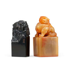 A BLACK ‘PHOENIX’ SOAPSTONE SEAL AND A HORN ‘MYTHICAL BEAST’ SEAL