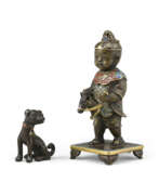 Statuettes. A RARE GILT-BRONZE AND CHAMPLEVE ENAMEL FIGURE OF A BOY AND DOG