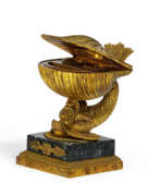 Décor. BRONZE WRITING IMPLEMENT WITH DOLPHIN