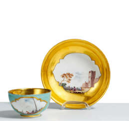 RICHLY GILT TURQUOISE-GROUND PORCELAIN TEA BOWL WITH SAUCER WITH SHIPPING SCENES