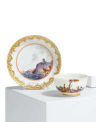 PORCELAIN TEA BOWL WITH SAUCER WITH SURROUNDING COASTAL LANDSCAPE AND SHIPWRECK