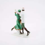 PORCELAIN FIGURINE ENSEMBLE OF DANCING ICE SKATERS - photo 2