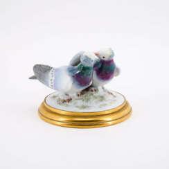 PORCELAIN ENSEMBLES OF A PAIR OF PIGEONS BILLING AND COOING