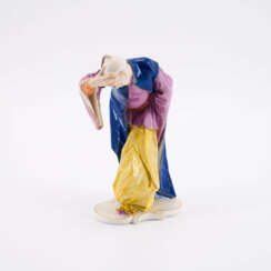 PORCELAIN FIGURINE OF A CHINESE MAN, BOWING HIS HEAD