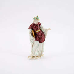 PORCELAIN FIGURINE OF A CHINESE PRIEST