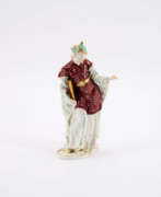 Aperçu. PORCELAIN FIGURINE OF A CHINESE PRIEST