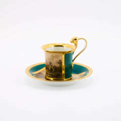 PORCELAIN BIEDERMEIER CUP AND SAUCER DEPCTING A LANDSCAPE VIEW