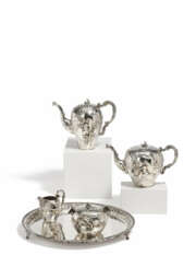 FOUR PARTS SILVER COFFEE AND TEA SERVICE WITH CUPIDS