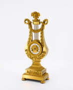 Dekorative Uhren. BRONZE LYRAPENDULE