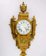 Dekorative Uhren. LARGE BRONZE CARTEL LOUIS XVI