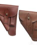 Accessories. Zwei Holster für Taschenpistolen