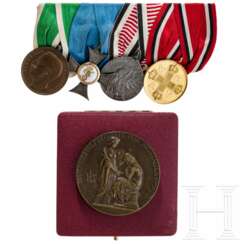 Vierteilige Frackspange, wohl eines Sanitäters in den Kolonien