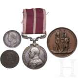 Vier Medaillen - Foto 1