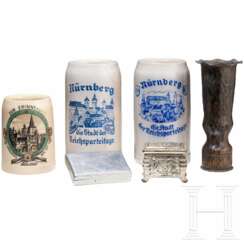 A collection of beer mugs, memorabilia and a "Feldherrnhalle" case