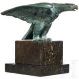 A desk eagle on a stone base - photo 1
