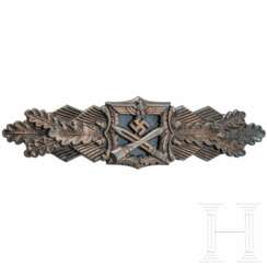 A Close Combat Clasp in Bronze, manufacturer JFS