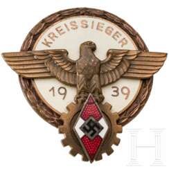 A badge "Kreissieger im Reichsberufswettkampf 1939", manufacturer Wagner
