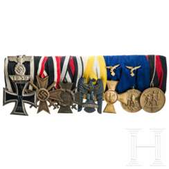 An 8-piece medal bar of an officer of the Luftwaffe, with Clasp to 1914 Iron Cross 2nd Class and Silesian Eagle Order