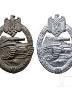 Overview. A Tank Assault Badge in Silver and Bronze