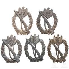 A collection of Infantry Assault Badges in Silver
