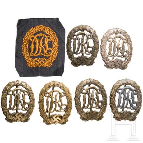 A collection of German Sports Badges in Silver and Bronze - Foto 1