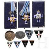 A collection of Mothers' Crosses, Frauenschaft badges, and RADwJ badges - photo 1