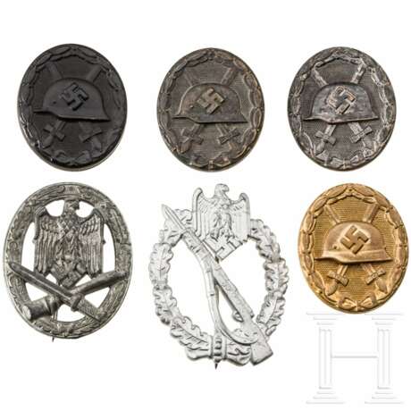Four Wound Badges, a General Assault Badge, and an Infantry Assault Badge in Silver - photo 1