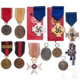 A collection of medals and decorations - photo 1