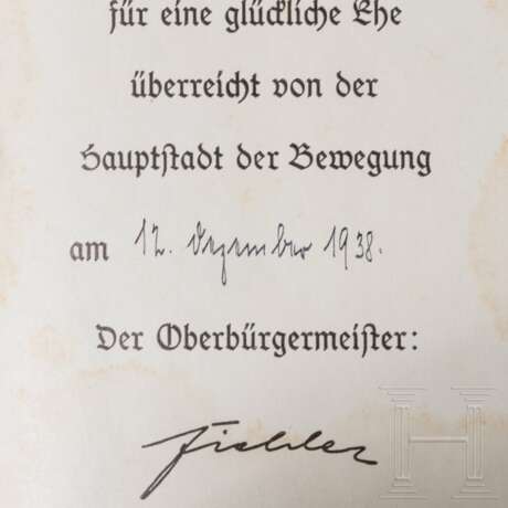 Two NSDAP Long Service Awards in Bronze, "Mein Kampf" with slipcase and a police award certificate - photo 4 Two NSDAP Long Service Awards in Bronze, "Mein Kampf" with slipcase and a police award certificate - photo 4