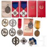 A collection of badges with cases of issue and bags - photo 1