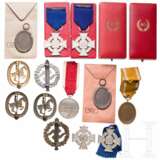 A collection of badges with cases of issue and bags - photo 2