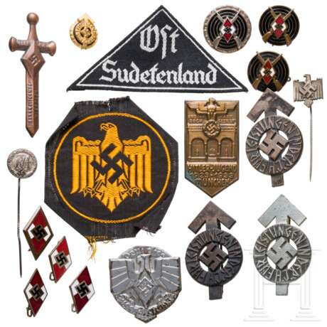 A collection of HJ badges, tinnies, and insignia - фото 1 A collection of HJ badges, tinnies, and insignia - фото 1