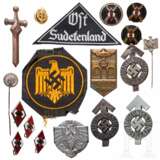 A collection of HJ badges, tinnies, and insignia - фото 1
