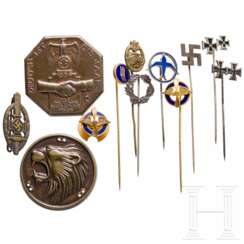 A collection of pins, badges and a Freikorps Epp sleeve badge