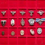 A collection of miniatures, pins and membership badges, with Knight's Cross miniature - фото 2