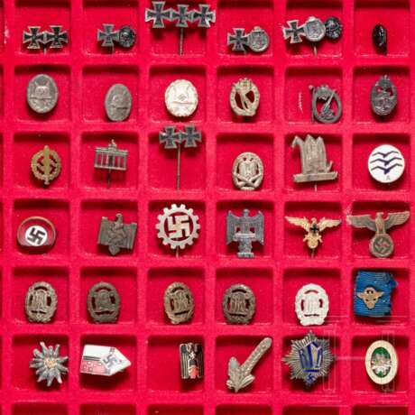 A collection of miniatures, pins and membership badges, with Knight's Cross miniature - фото 3