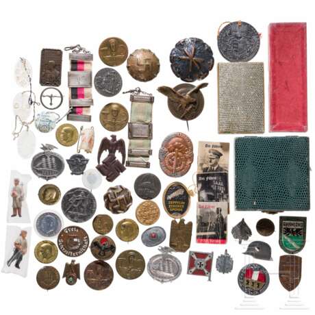 A collection of badges, tinnies, WHW badges, cases of issue, and a Carinthia commemorative medal - photo 1