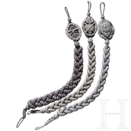 Three Heer and Luftwaffe shooting lanyards 1st class - photo 1 Three Heer and Luftwaffe shooting lanyards 1st class - photo 1