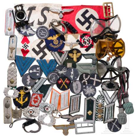A collection of insignia, armbands, equipment, spare parts, etc. - photo 1 A collection of insignia, armbands, equipment, spare parts, etc. - photo 1