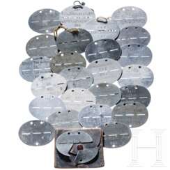 A collection of 25 Heer and Luftwaffe military ID discs